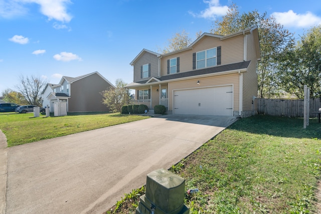 view of front property featuring a garage and a front lawn