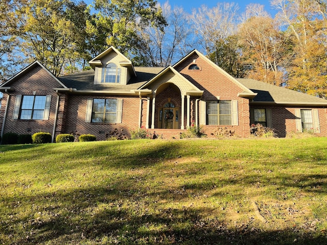 view of front of property with a front lawn