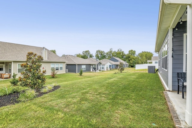 view of yard with central AC