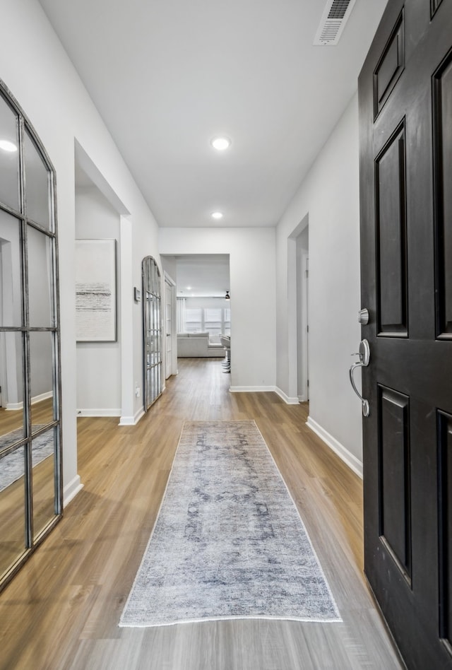 entrance foyer featuring light wood-type flooring