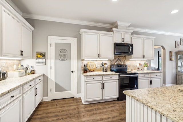 kitchen featuring white cabinetry, black electric range oven, dark hardwood / wood-style floors, and crown molding