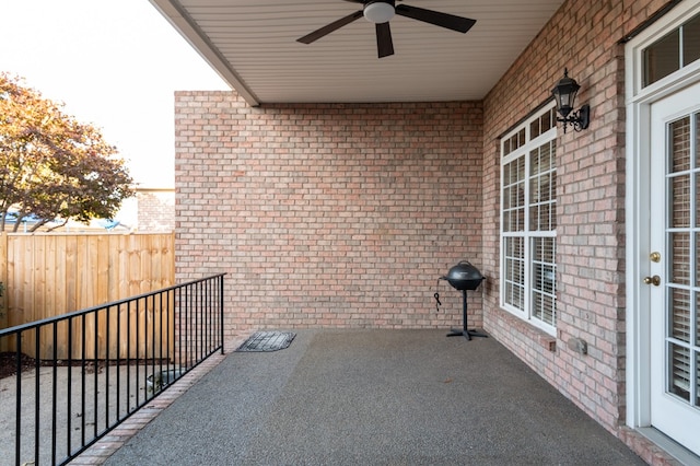 view of patio / terrace featuring ceiling fan and a balcony