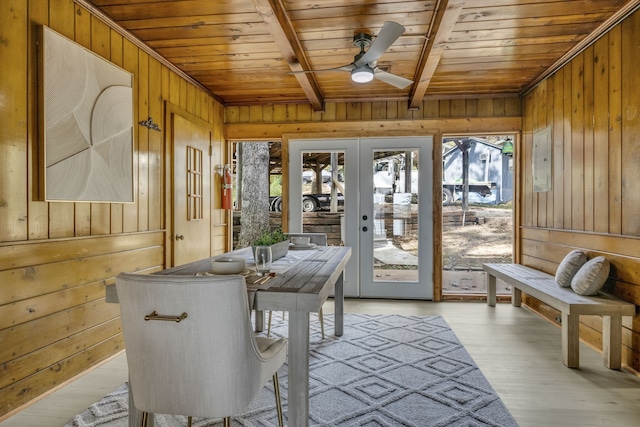 sunroom / solarium with beam ceiling, ceiling fan, french doors, and wooden ceiling