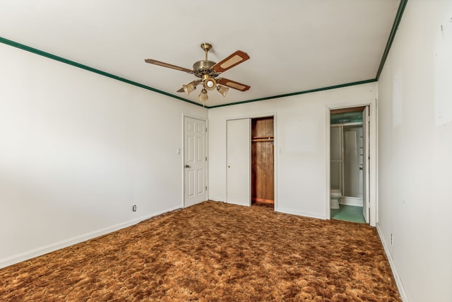 unfurnished bedroom with carpet, ensuite bath, ceiling fan, and crown molding