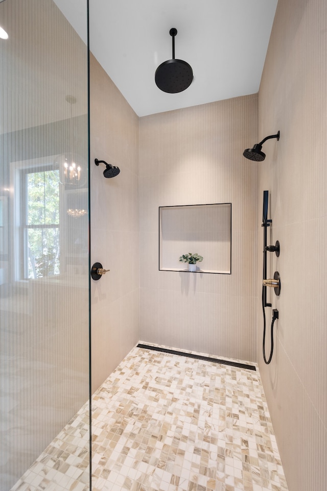 bathroom with tiled shower