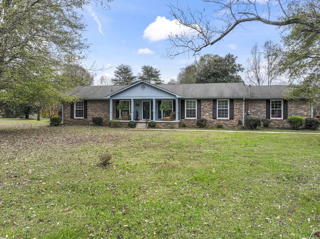 ranch-style house with a front lawn