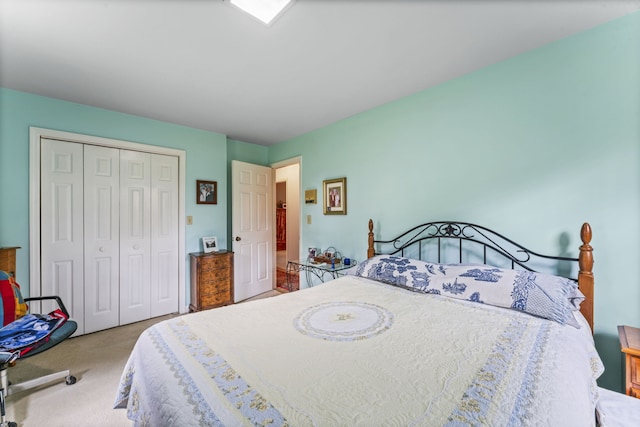 bedroom with a closet and carpet