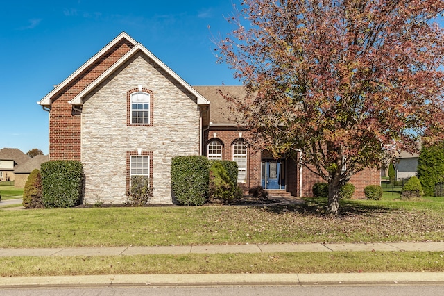 view of front facade with a front lawn