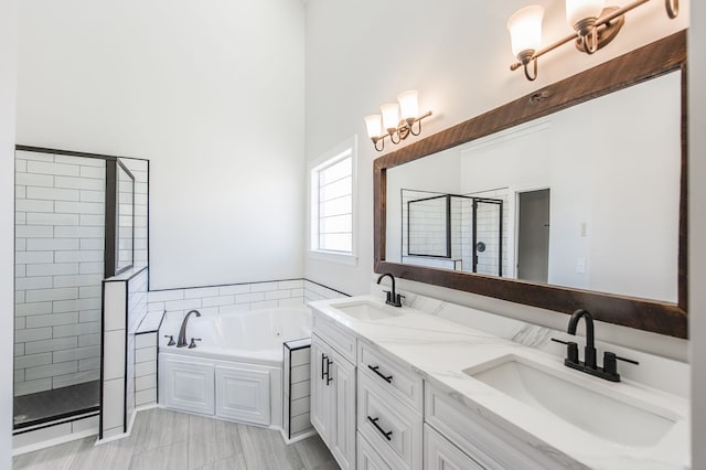 bathroom with vanity and plus walk in shower