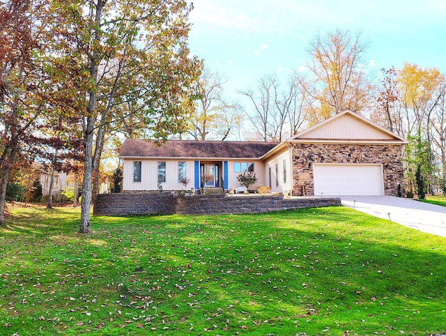 ranch-style home with a front lawn and a garage