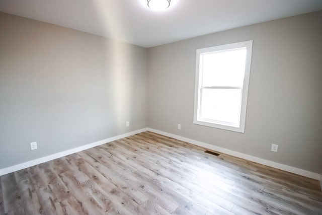 empty room featuring light hardwood / wood-style floors