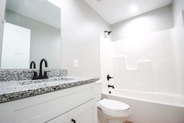 full bathroom with toilet, shower / tub combination, and vanity