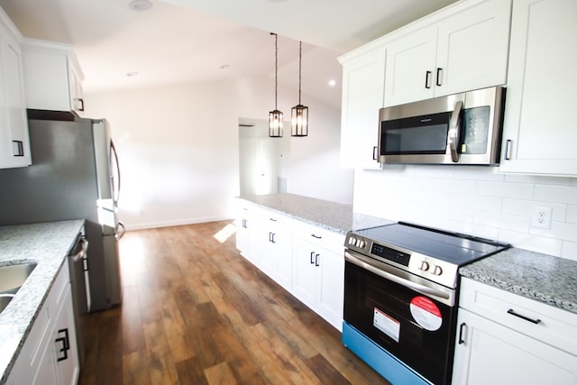 kitchen with light stone counters, appliances with stainless steel finishes, dark hardwood / wood-style floors, pendant lighting, and white cabinets