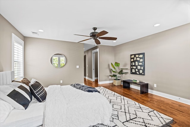 bedroom featuring dark wood-type flooring and ceiling fan