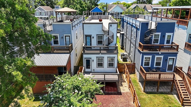 rear view of house with a deck