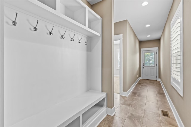 mudroom featuring light tile patterned flooring