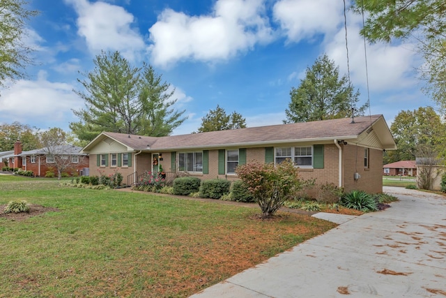 single story home with a front yard