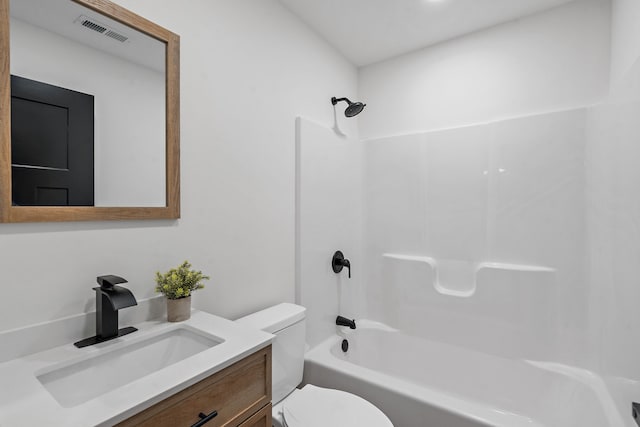 full bathroom featuring vanity, toilet, and tub / shower combination