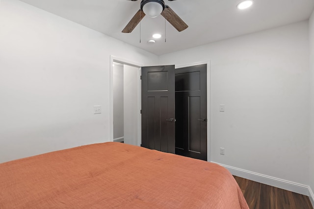 bedroom featuring a closet, ceiling fan, and hardwood / wood-style floors