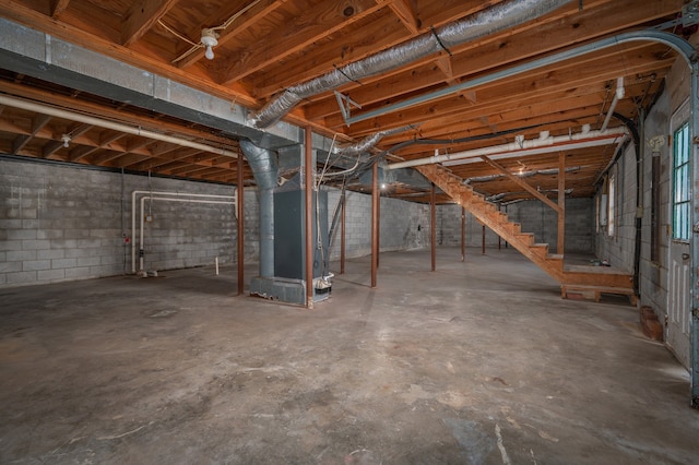 basement featuring heating unit