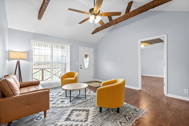 living area featuring lofted ceiling with beams, dark hardwood / wood-style flooring, and ceiling fan