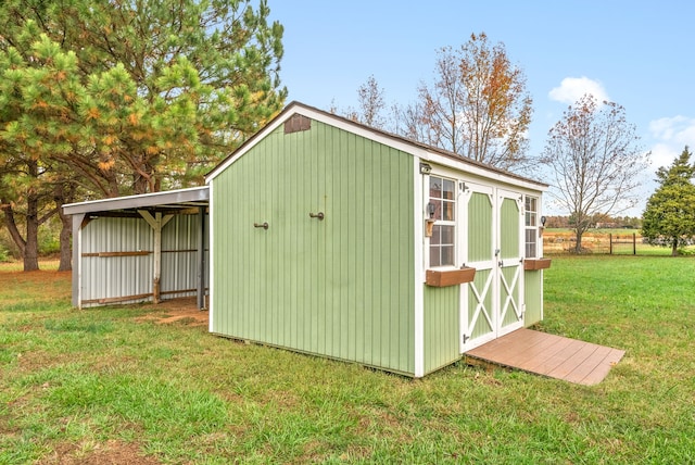 view of outdoor structure with a yard