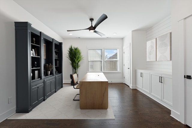 office area featuring ceiling fan and dark wood-type flooring