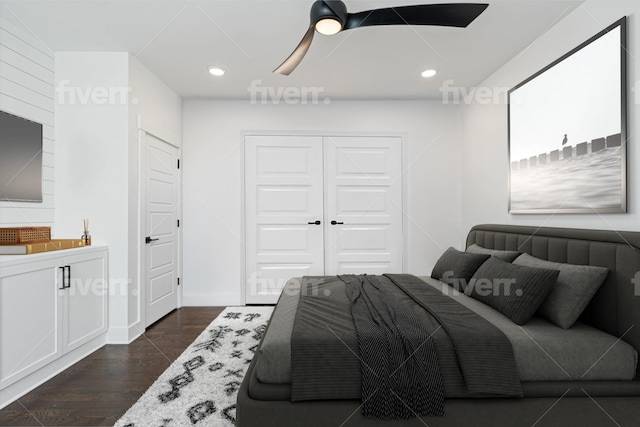 bedroom with ceiling fan, a closet, and dark hardwood / wood-style floors