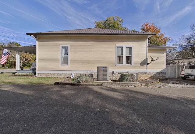 view of side of property featuring cooling unit