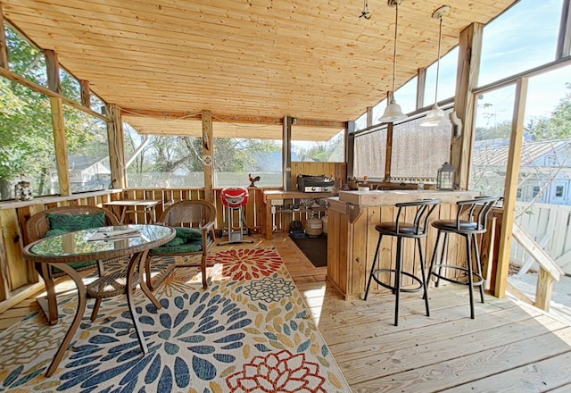 sunroom / solarium with wooden ceiling