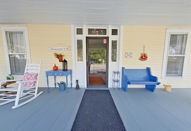 property entrance featuring covered porch