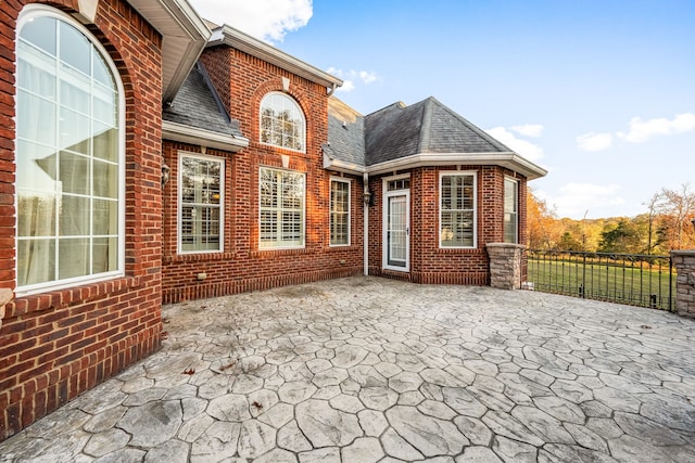 back of property with a patio area