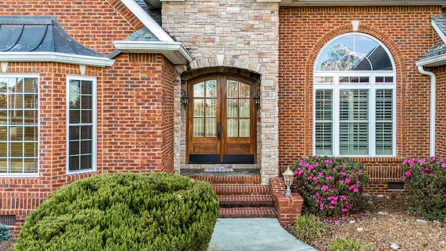 doorway to property featuring french doors