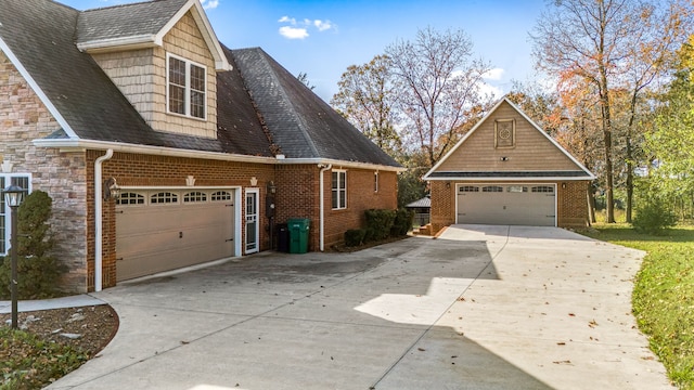 view of side of home featuring a garage