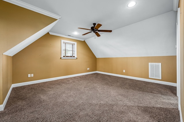 bonus room featuring ceiling fan, carpet flooring, and vaulted ceiling