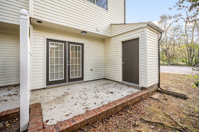 property entrance with a patio