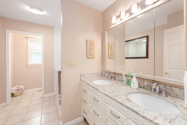 bathroom featuring vanity and tile patterned flooring