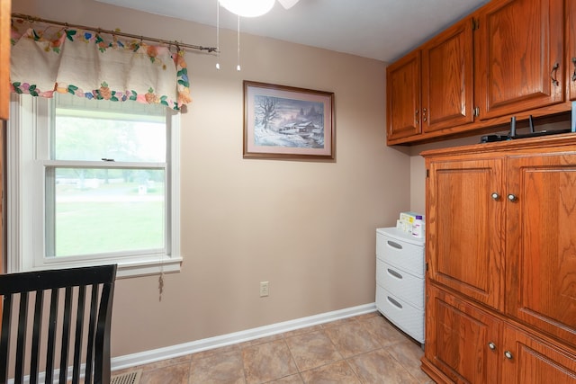 interior space featuring light tile patterned floors