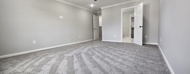 unfurnished bedroom with carpet and ornamental molding