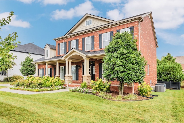 view of front facade with a porch and a front lawn