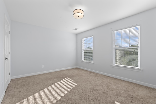 view of carpeted spare room