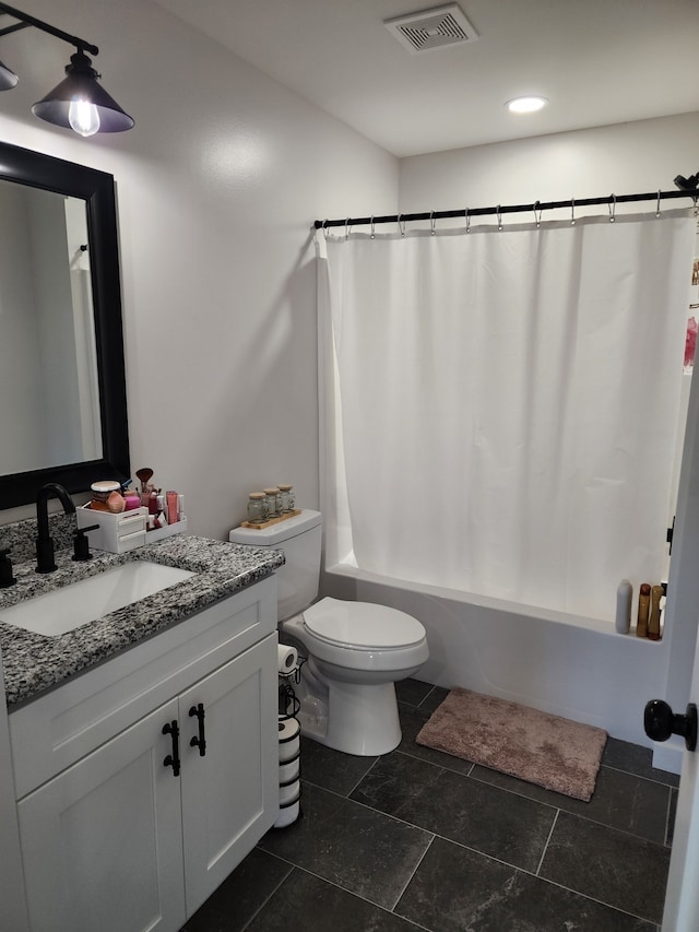 full bathroom with tile patterned flooring, vanity, toilet, and shower / tub combo with curtain