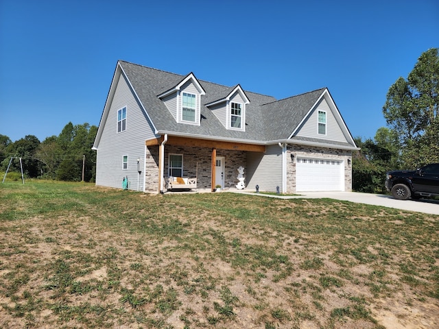 view of front facade with a front yard and a porch