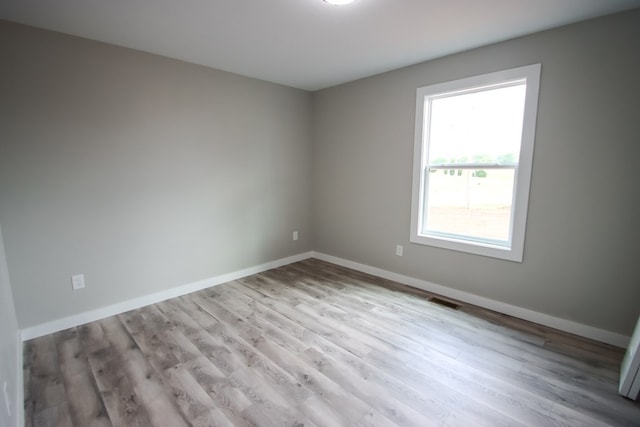 empty room featuring light wood-type flooring