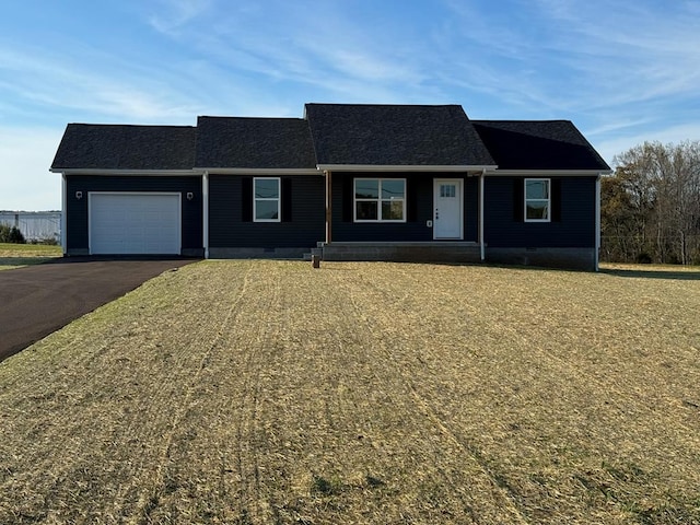 ranch-style home with a garage