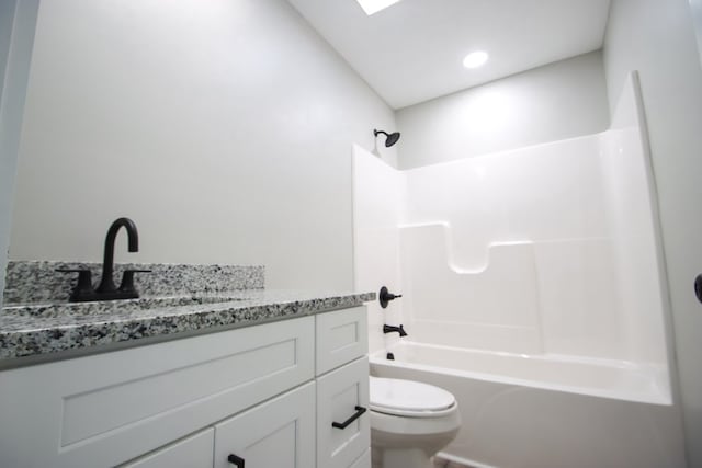 full bathroom with vanity, toilet, and shower / bathtub combination