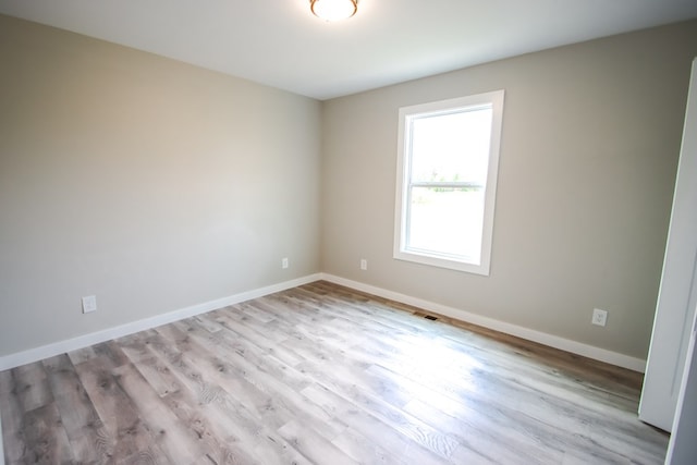 empty room featuring light wood-type flooring