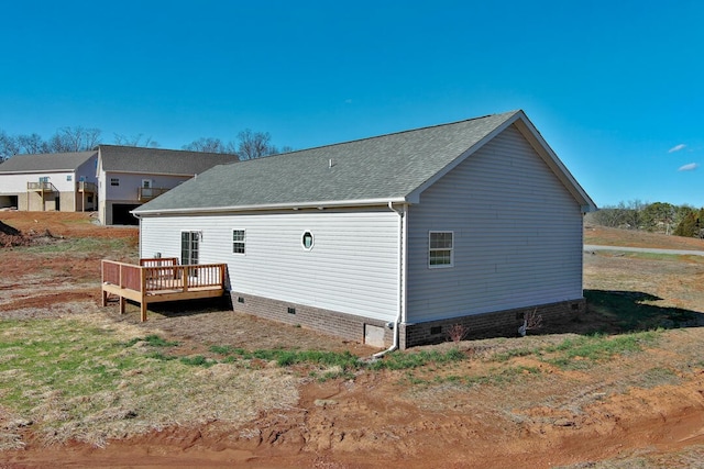 rear view of property with a deck