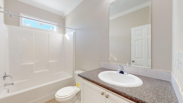 full bathroom featuring vanity, ornamental molding, toilet, and washtub / shower combination