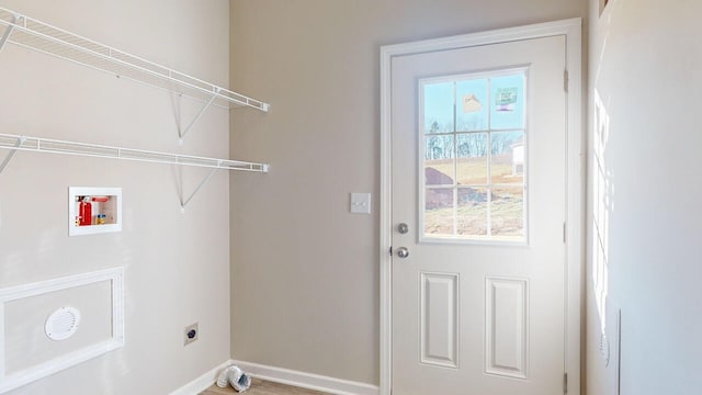 clothes washing area with hookup for an electric dryer and washer hookup